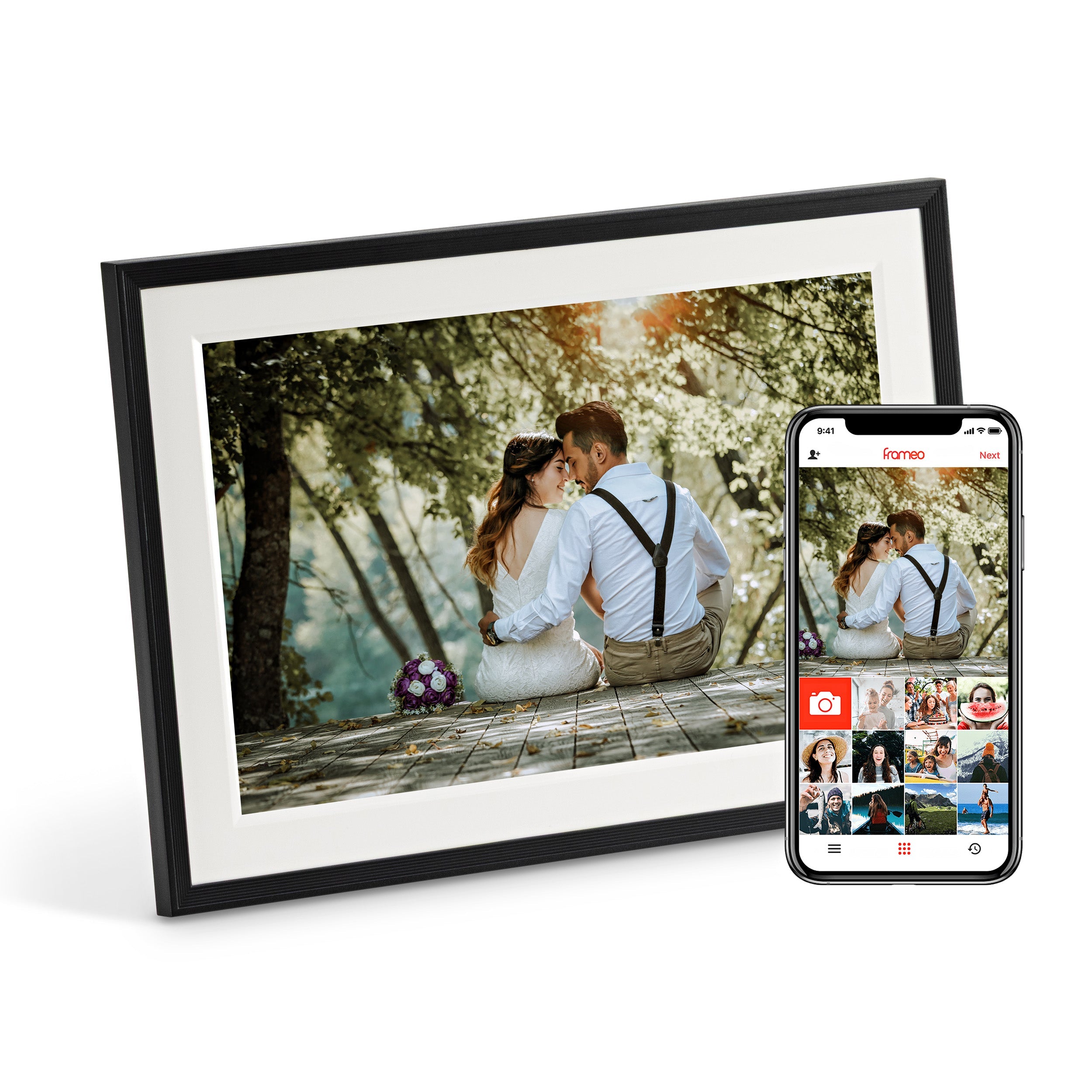 LuvLink digital photo frame displaying a wedding photo of a couple on a bench, with a smartphone showing the companion app beside it.
