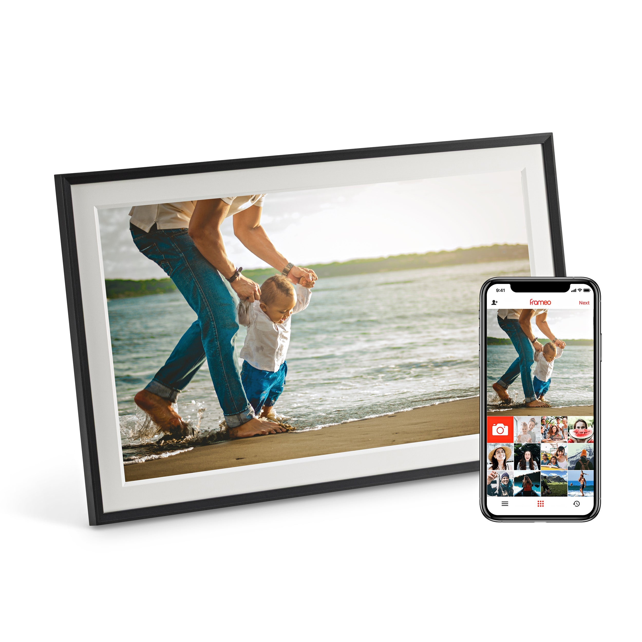 LuvLink digital photo frame displaying a beach photo of an adult and child wading in water, alongside a smartphone showing the companion app.